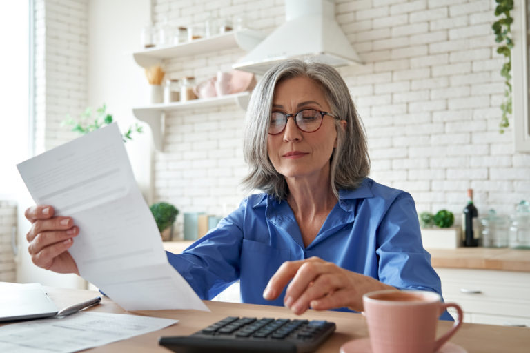 A woman struggling with overwhelming debt.